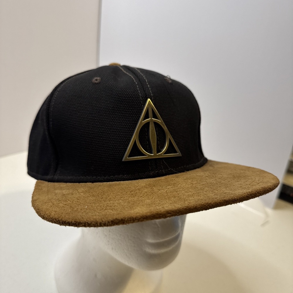 Listed as a "Black & Suade Deathly Hallows SnapBack Hat"